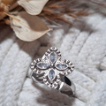 bague fleur argentée rotative ajustable bijou relaxant