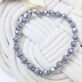Bracelet élastique femme perles facettées grises