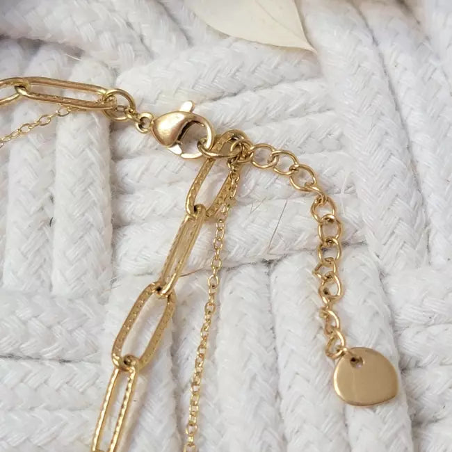 Fermoir et maillons dorés du bracelet femme en acier inoxydable ajustable