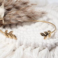 Bracelet ouvert doré élégant décoré de feuilles d’olivier