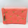 Trousse en velours côtelé corail brodée de cœurs dorés avec pompon, pochette zippée