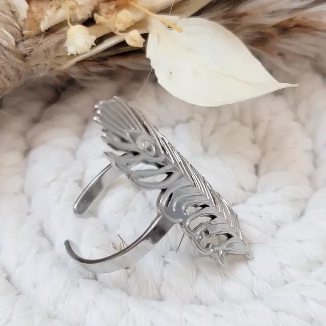Vue de profil bague plume ajustable argentée en acier inoxydable